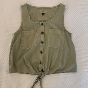 Green sleeveless top with front tie